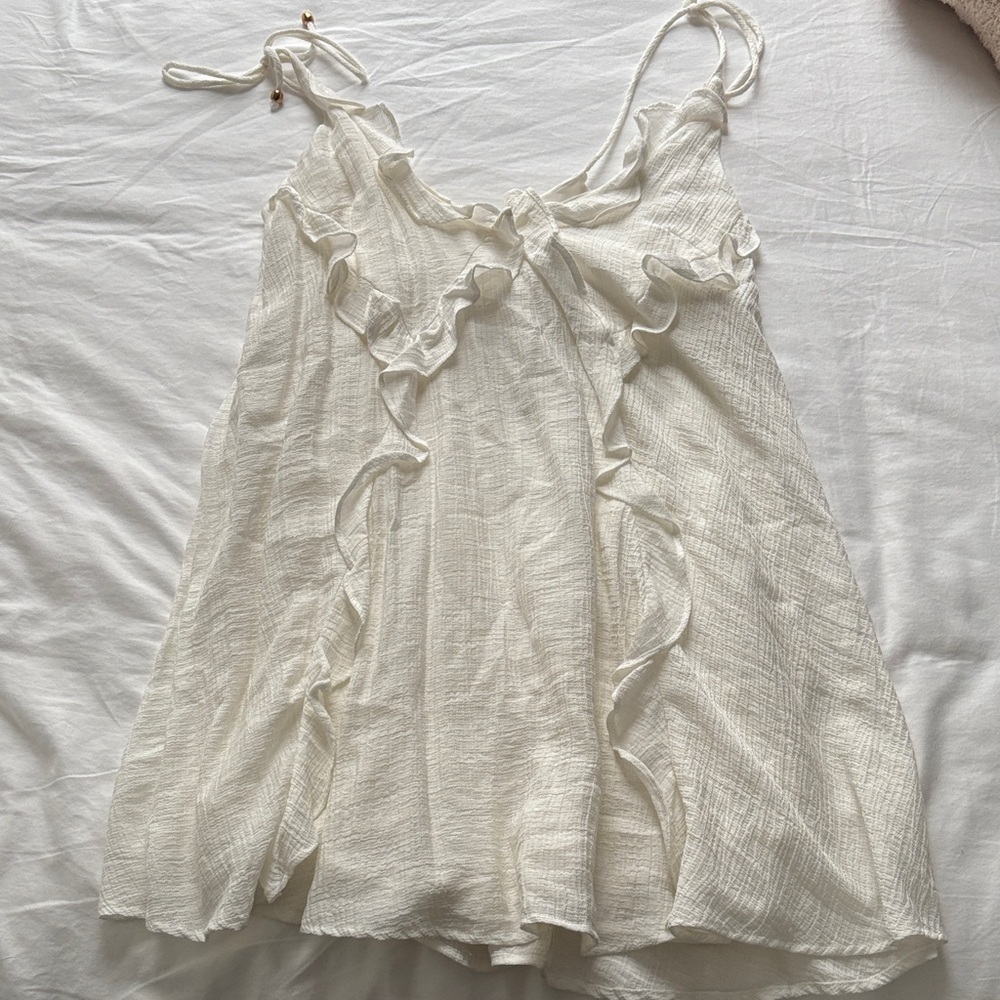 Indikah White Textured Sleeveless Top